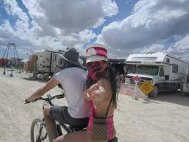 customer photo riding companion bike seat out on the desert
