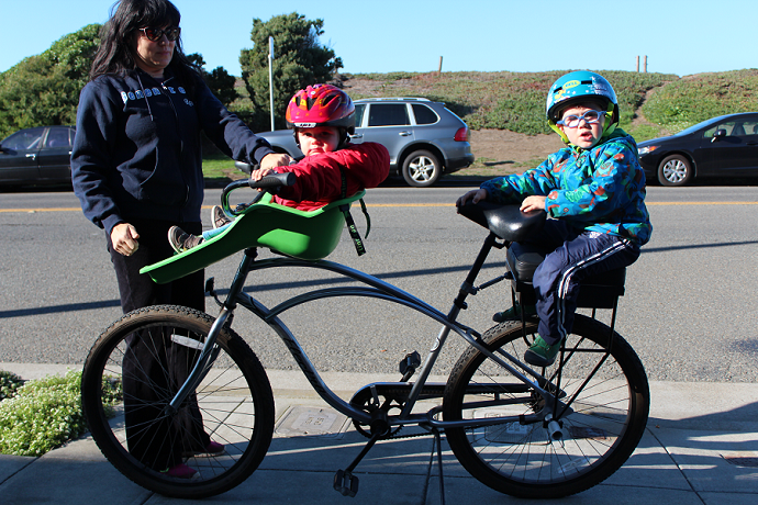 cruiser with a front-mounted bike child seat and a Companion Bike Seat
