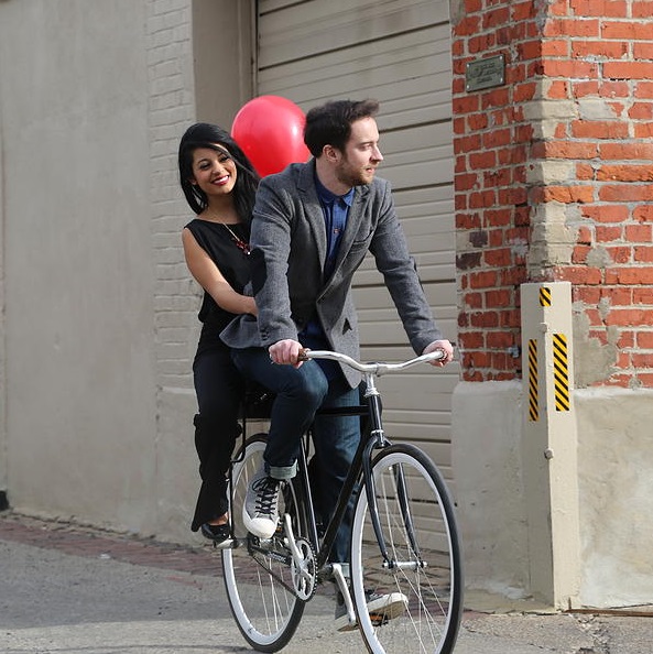 Newly married couple riding on their Companion Bike Seat