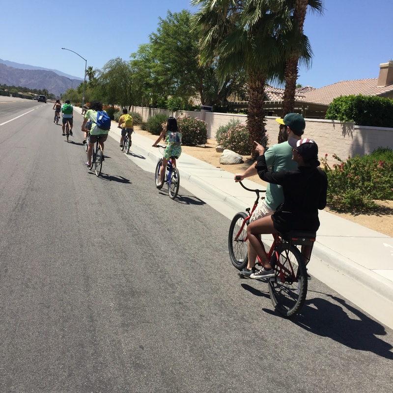 group bike ride with companion bike seat to coachella