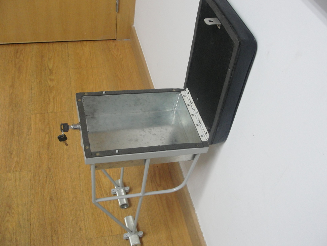 metal prototype of Companion Bike Seat stash-box open
