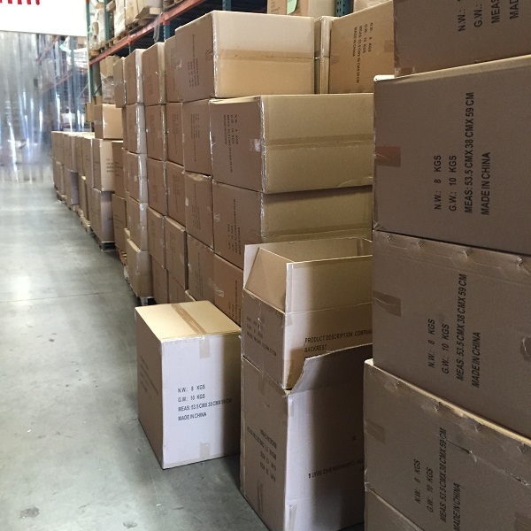 boxes of companion bike seats in a warehouse